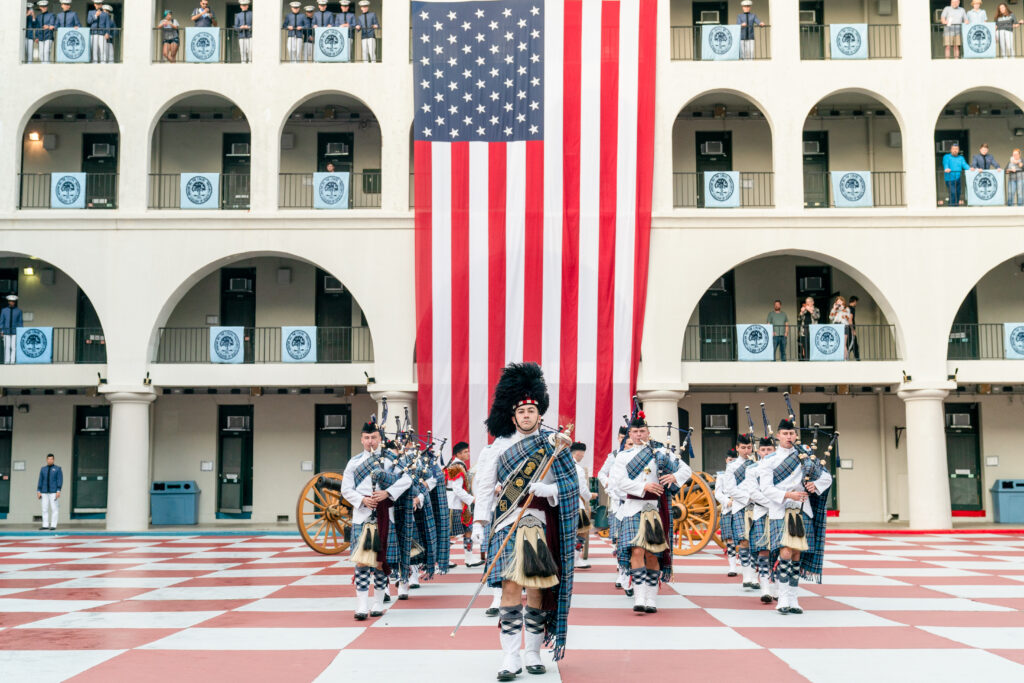 The band marching through the barracks